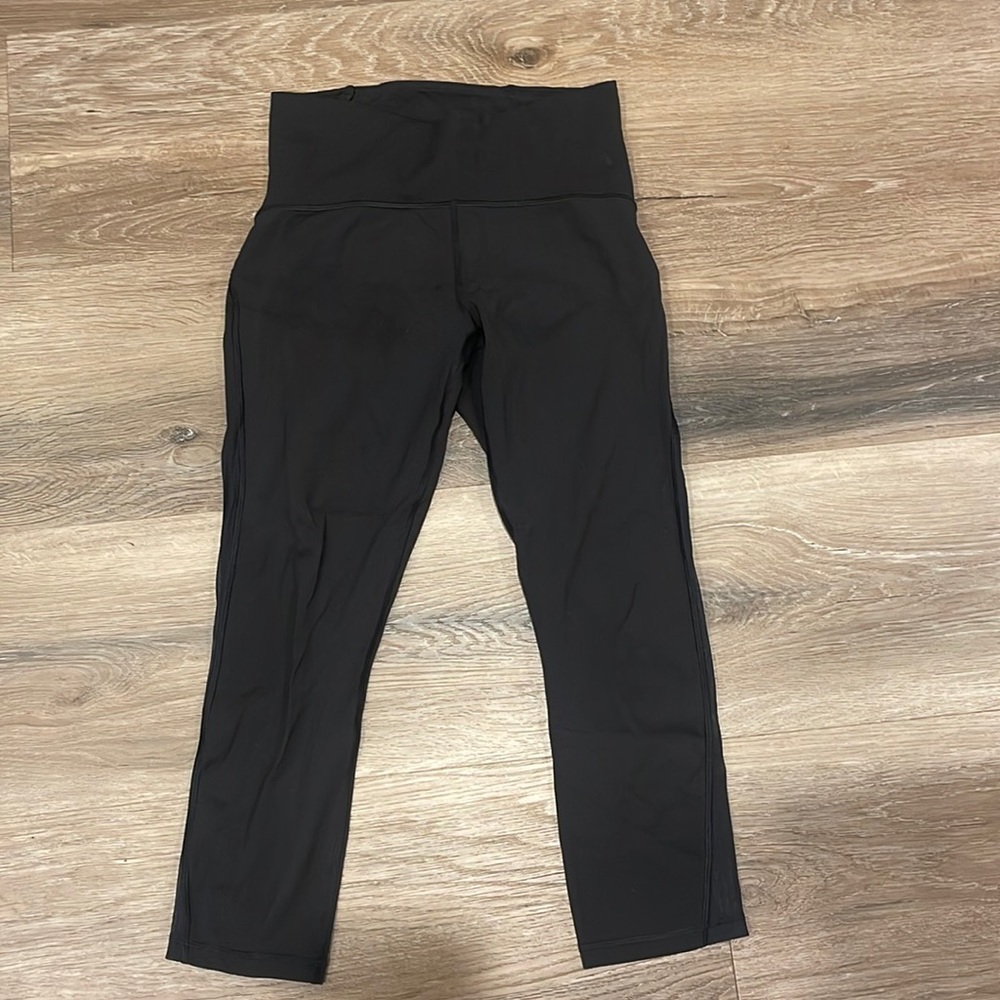 Size 6 Lululemon leggings with mesh on the side